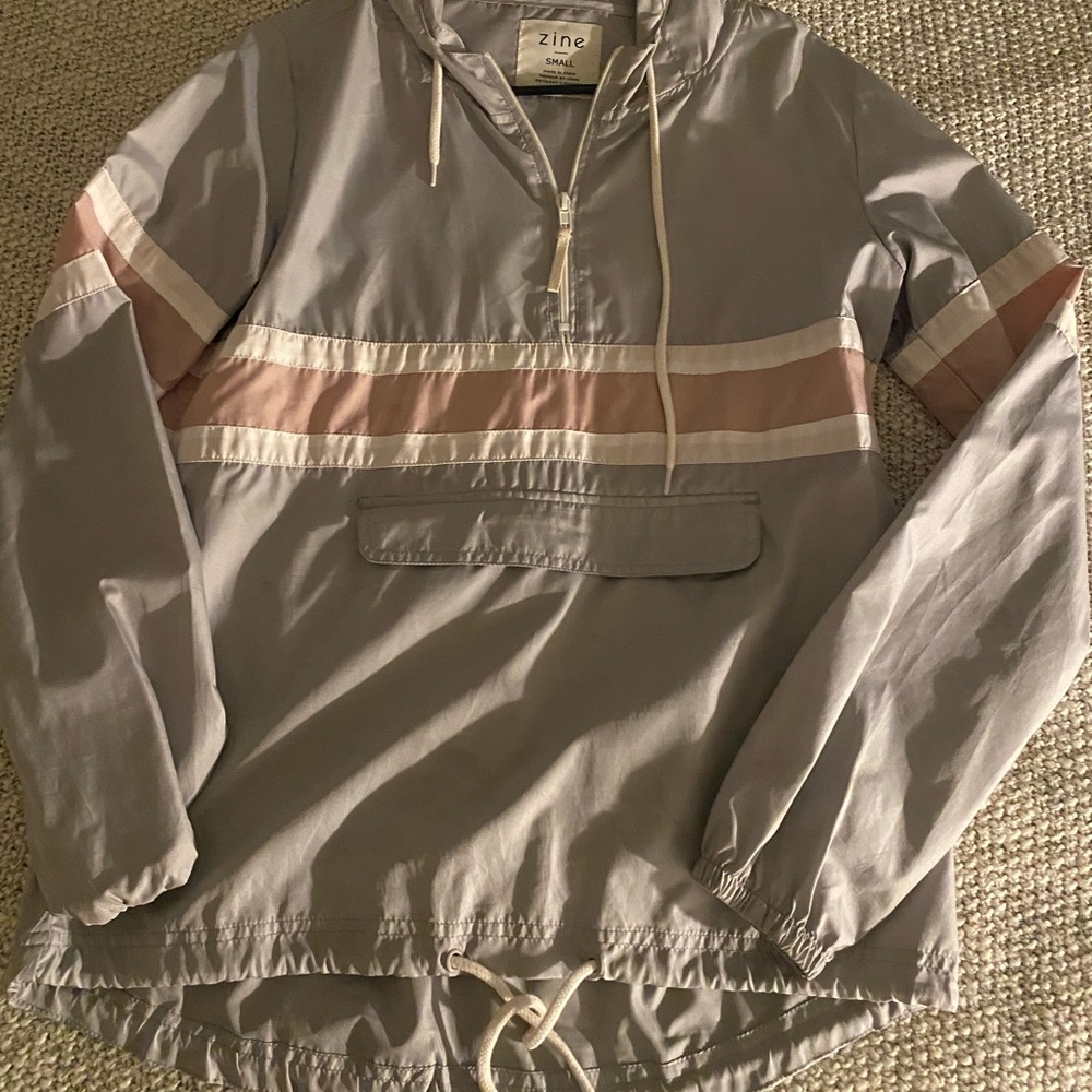 Light grey windbreaker with drawstring